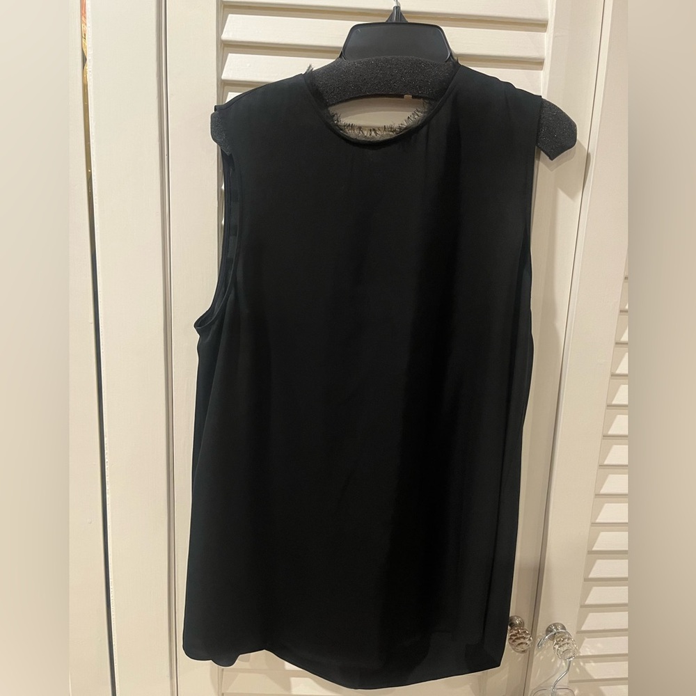 Theory black silk blouse with un-hemmed neckline